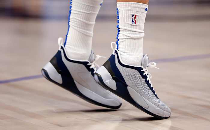 Grey and black Jordan Luka 1 shoes.